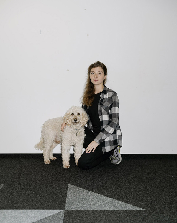 portrait of Irina from Kharkiv with her dog